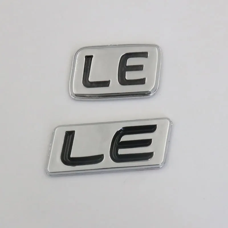 Для Toyota LE эмблема черный серебристый значок на задний багажник автомобиля наклейки с логотипом автомобиля
Для Toyota LE эмблема черный серебристый значок на задний багажник автомобиля наклейки с логотипом автомобиля