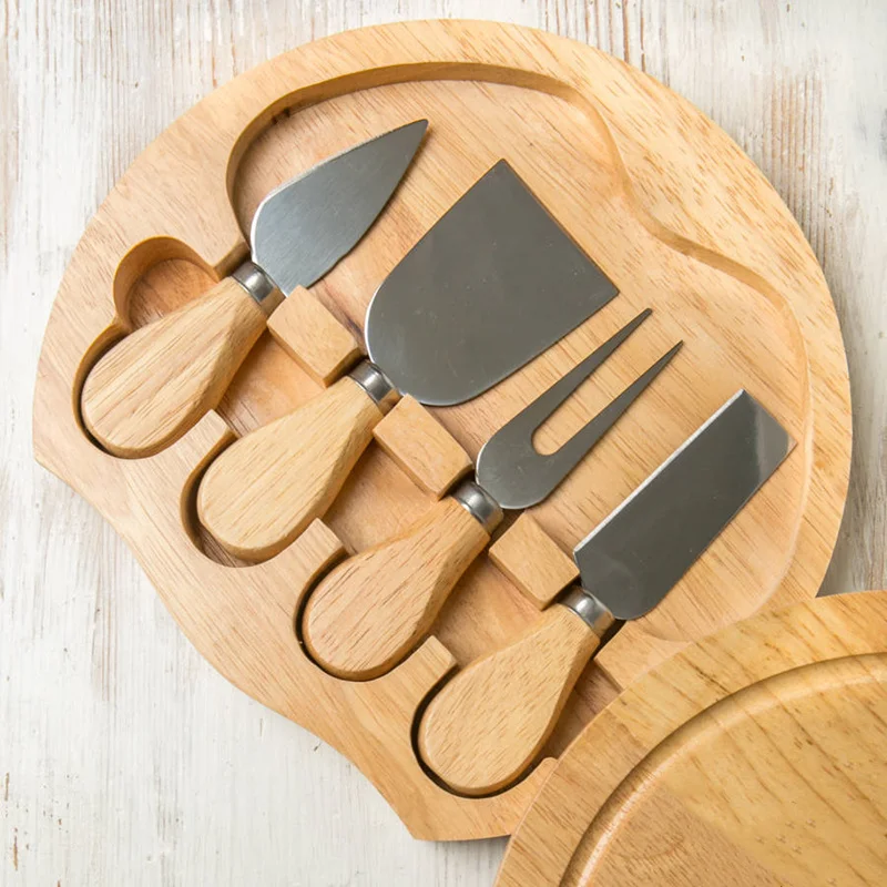 4 Cheese Knives Set Cheese Cutlery Steel Stainless Cheese Slicer Cutter Wood Handle Mini Knife,Butter Knife,Spatula& ForK 
4 Cheese Knives Set Cheese Cutlery Steel Stainless Cheese Slicer Cutter Wood Handle Mini Knife,Butter Knife,Spatula& ForK
