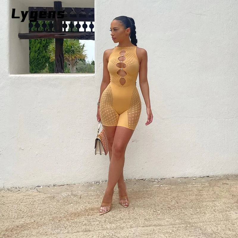 Lygens Heart Shape Decoration Polka Dot Hollow Out Rompers 2021 Sleeveless Summer Fall Playsuit Women One Piece New Streetwear
Lygens Heart Shape Decoration Polka Dot Hollow Out Rompers 2021 Sleeveless Summer Fall Playsuit Women One Piece New Streetwear