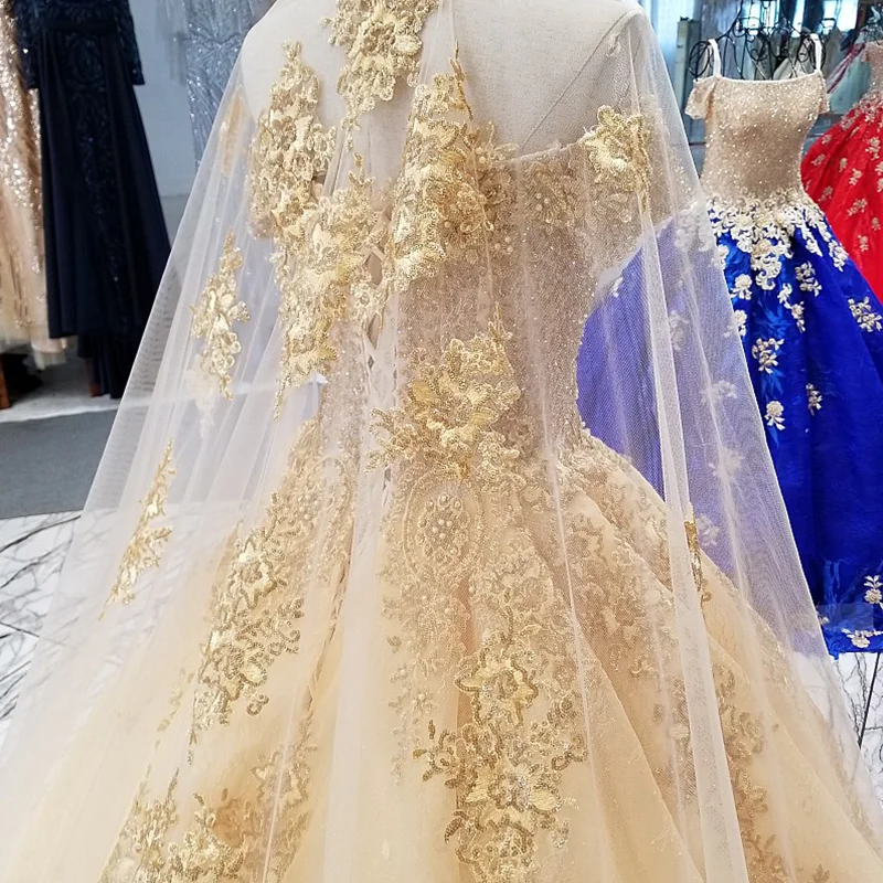 LS09610 golden sexy off shoulder boat neck shinny wedding gown 2018 with long veil champagne bridal wedding dress free shipping
LS09610 golden sexy off shoulder boat neck shinny wedding gown 2018 with long veil champagne bridal wedding dress free shipping