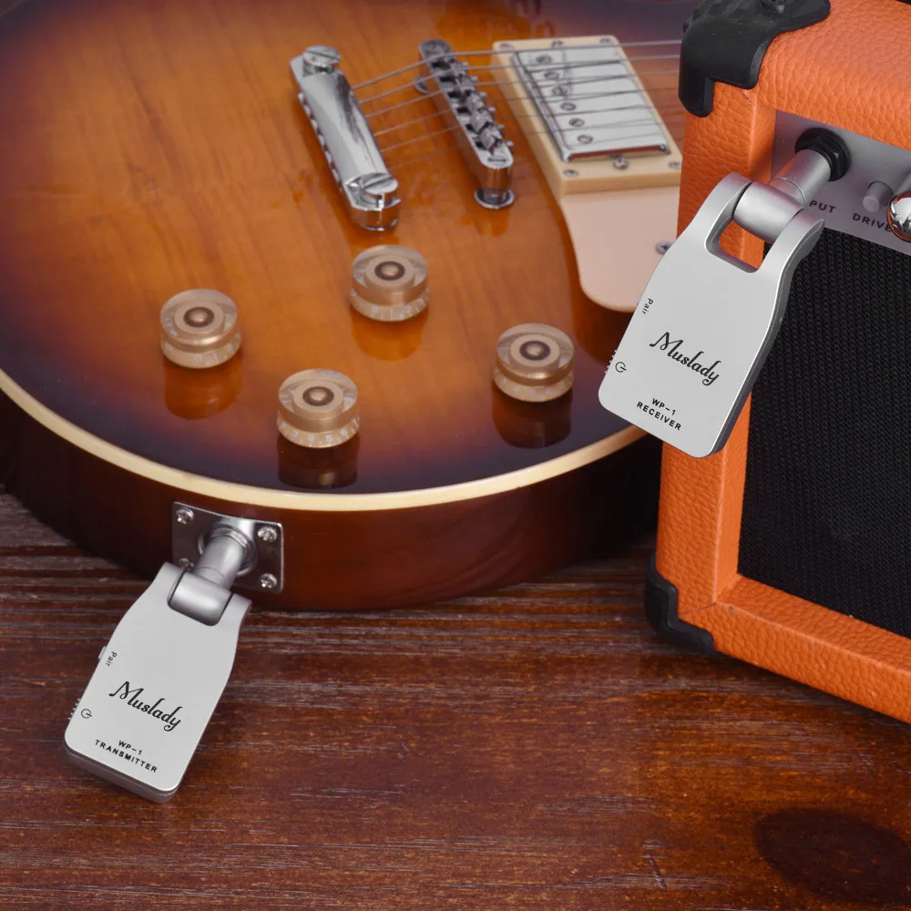 Muslady 2.4G Wireless Guitar System Transmitter & Receiver 30M Transmission Range for Electric Guitar Bass Rechargeable Battery
Muslady 2.4G Wireless Guitar System Transmitter & Receiver 30M Transmission Range for Electric Guitar Bass Rechargeable Battery