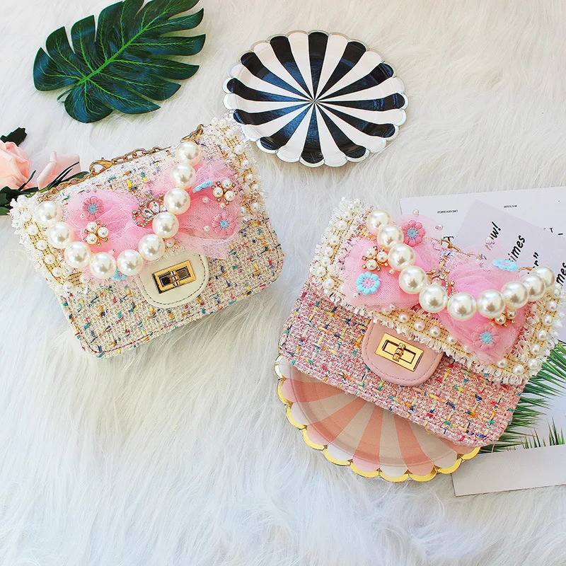 Children's Mini Bow Handbags Tote Cute Pearl Crossbody Bags for Women Small Coin Wallet Pouch Kids Girls Princess Party Purse
Children's Mini Bow Handbags Tote Cute Pearl Crossbody Bags for Women Small Coin Wallet Pouch Kids Girls Princess Party Purse