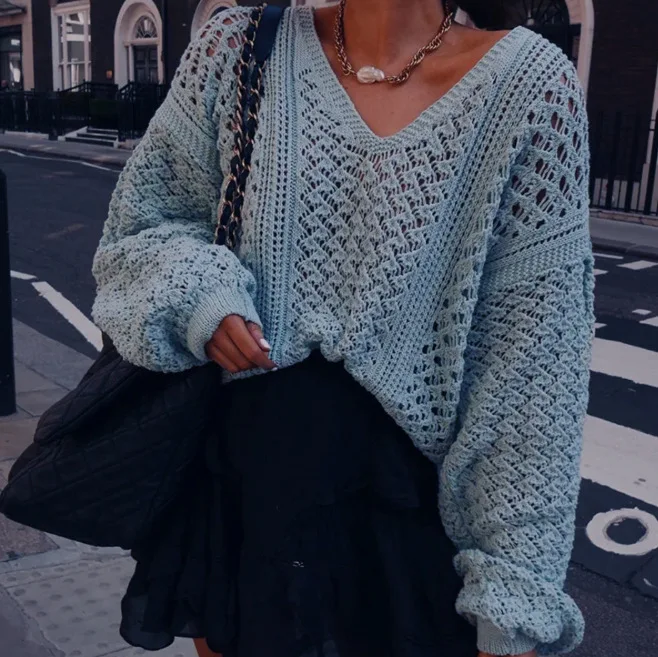 2021 Spring and Autumn best-selling women's solid color loose knitting clothes sexy V-neck hollow sweater
2021 Spring and Autumn best-selling women's solid color loose knitting clothes sexy V-neck hollow sweater
