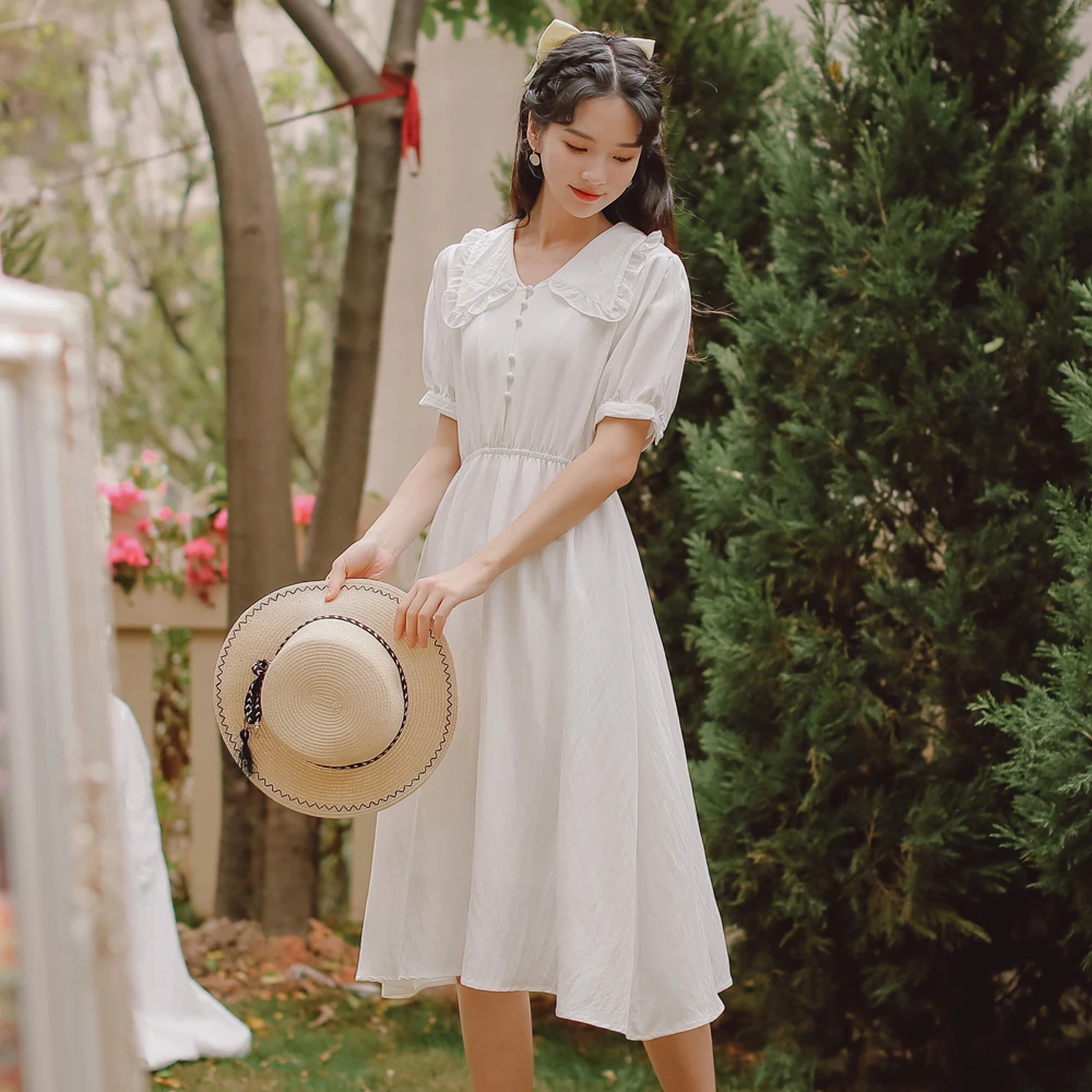 Women Ruffled Short-sleeved Polyester Dress V-neck Elastic Waist Button Beach Midi Dresses Vintage Sexy Vestido 
Women Ruffled Short-sleeved Polyester Dress V-neck Elastic Waist Button Beach Midi Dresses Vintage Sexy Vestido