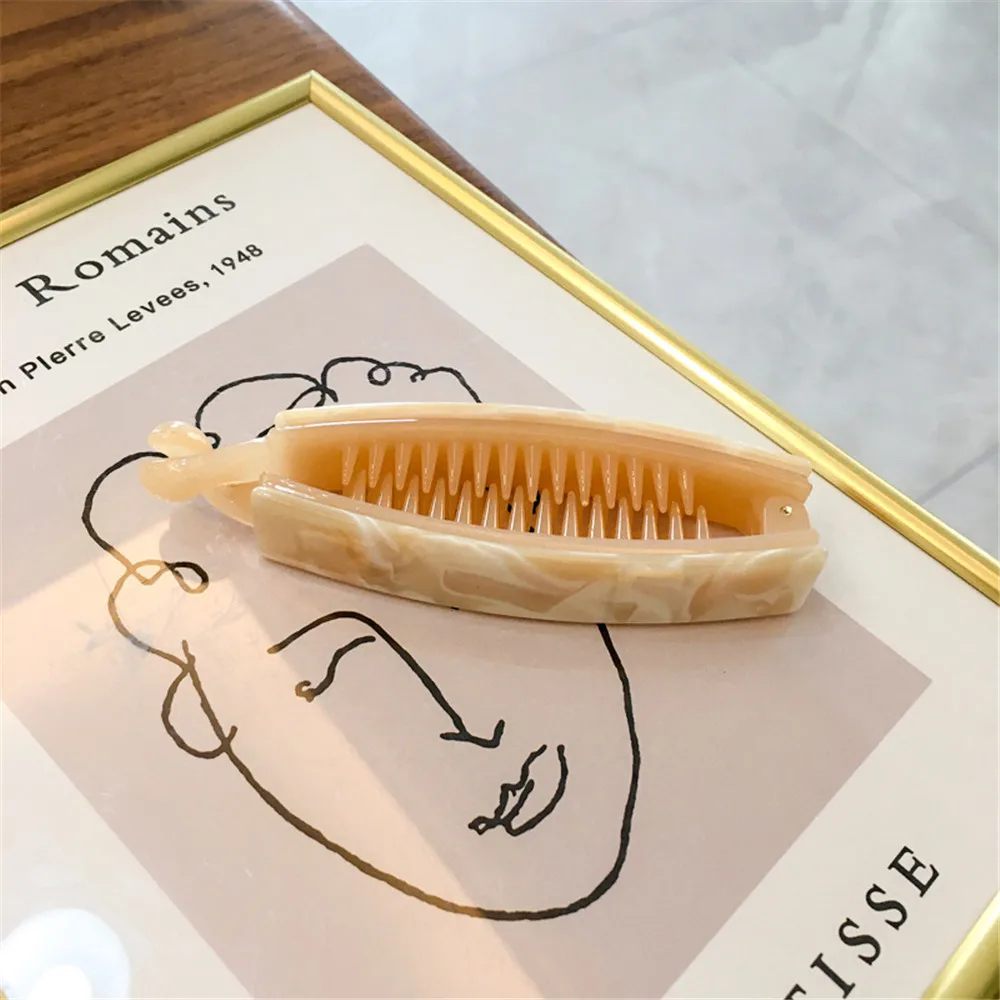 New Ins Korea Fashion Temperament Elegant Simple Banana Clip Ponytail Hairpin Acetate Plate Adult Women's Twist Clip
New Ins Korea Fashion Temperament Elegant Simple Banana Clip Ponytail Hairpin Acetate Plate Adult Women's Twist Clip