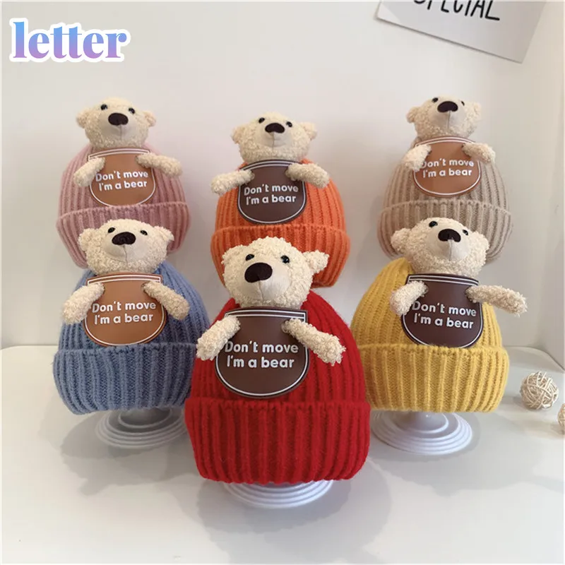 Toddler Baby Beanie Cap Stylish Winter Warm Knit Hat with Bear Doll for Boys and Girls
Toddler Baby Beanie Cap Stylish Winter Warm Knit Hat with Bear Doll for Boys and Girls