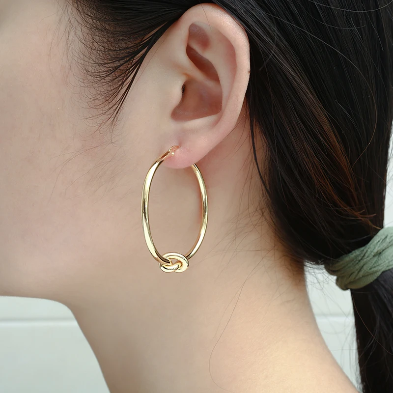 New fashion Knot Hoop Earring Personality Earrings for Women Exaggerated brass big earring women fashion jewelry does not fade 
New fashion Knot Hoop Earring Personality Earrings for Women Exaggerated brass big earring women fashion jewelry does not fade