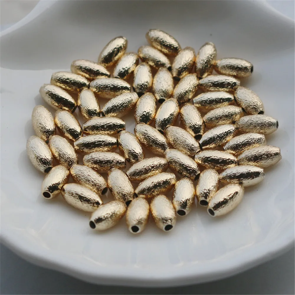 14K Gold Filled Frosted brushed millet beads 4x8mm tooth beads DIY jewelry material loose beads
14K Gold Filled Frosted brushed millet beads 4x8mm tooth beads DIY jewelry material loose beads