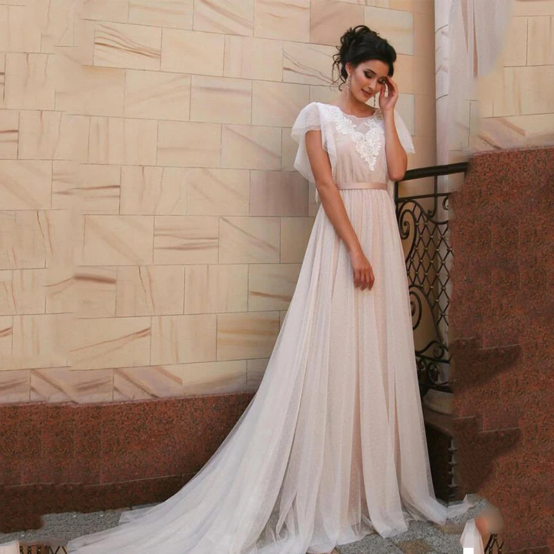 Bohemian Sexy Elegant Lace Wedding Dress 2021 O Neck Short Sleeve Illusion Tulle Sweep Train For Women Robe De Mariage Custom
Bohemian Sexy Elegant Lace Wedding Dress 2021 O Neck Short Sleeve Illusion Tulle Sweep Train For Women Robe De Mariage Custom
