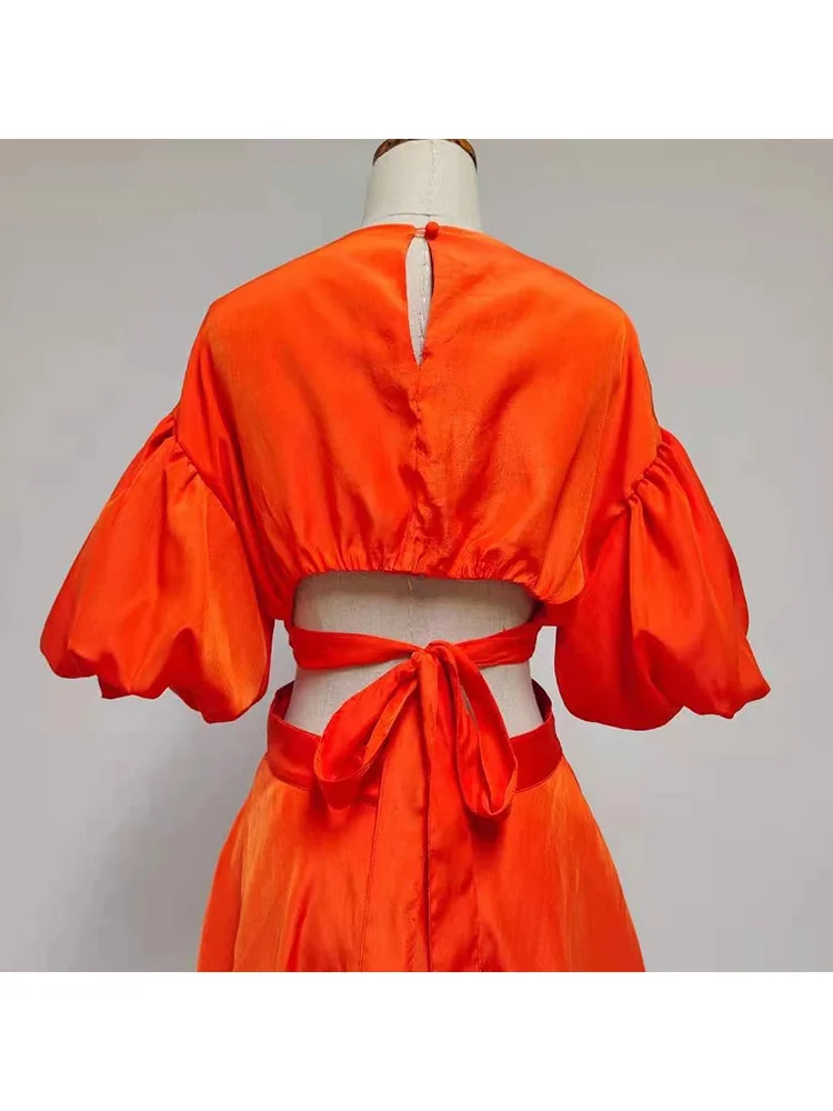 Solid color round neck pullover cross tie hollow sexy leaky waist loose big hem dress ladies summer new multi-level puff skirt
Solid color round neck pullover cross tie hollow sexy leaky waist loose big hem dress ladies summer new multi-level puff skirt