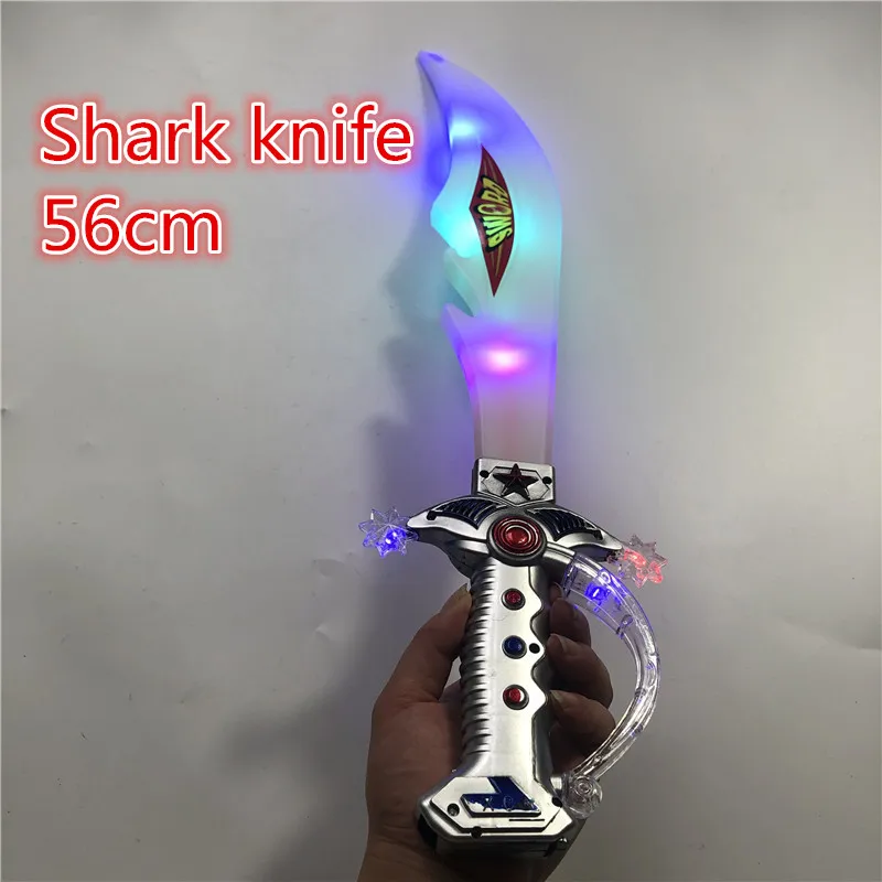 Eletronic Lightsaber Induction Shark sword Flashing UV Cutlass Simulation Plastic Light Toys Sword Children cosplay Props 56cm
Eletronic Lightsaber Induction Shark sword Flashing UV Cutlass Simulation Plastic Light Toys Sword Children cosplay Props 56cm