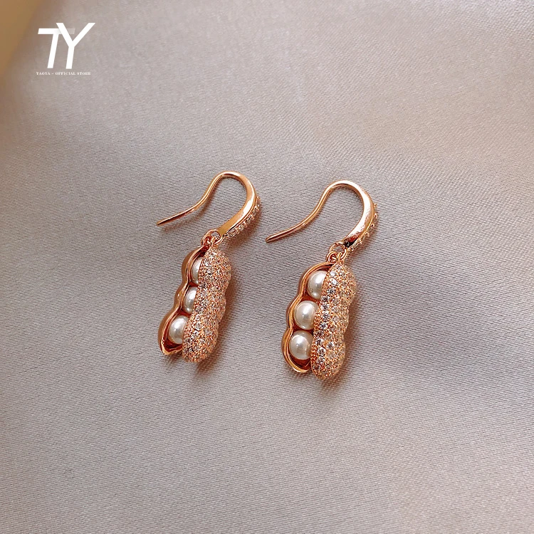 2020 new classic peanuts pearl pendant Earrings for woman Fashion unusual pea shaped accessories sexy girl's party Earrings
2020 new classic peanuts pearl pendant Earrings for woman Fashion unusual pea shaped accessories sexy girl's party Earrings