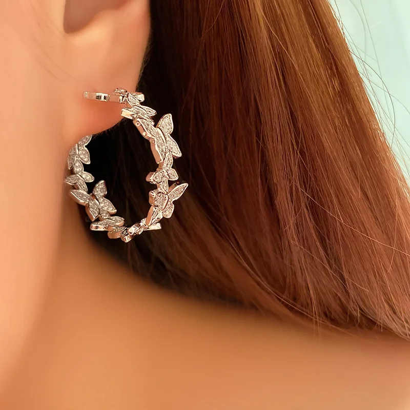 Simple irregular butterfly C-shaped earrings femininity 925 silver needle inlaid zircon earrings fairy Mori butterfly small
Simple irregular butterfly C-shaped earrings femininity 925 silver needle inlaid zircon earrings fairy Mori butterfly small
