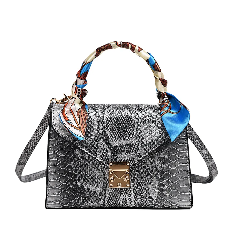 Foreign style fashionable bag 2020 new snake skin pattern hand held silk scarf women's bag texture fashion single shoulder bag 
Foreign style fashionable bag 2020 new snake skin pattern hand held silk scarf women's bag texture fashion single shoulder bag