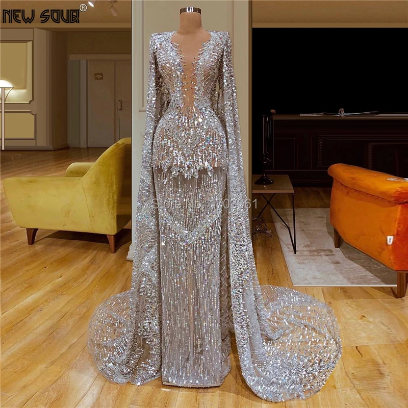 Женское вечернее платье длинное прозрачное серебристого цвета с блестками в