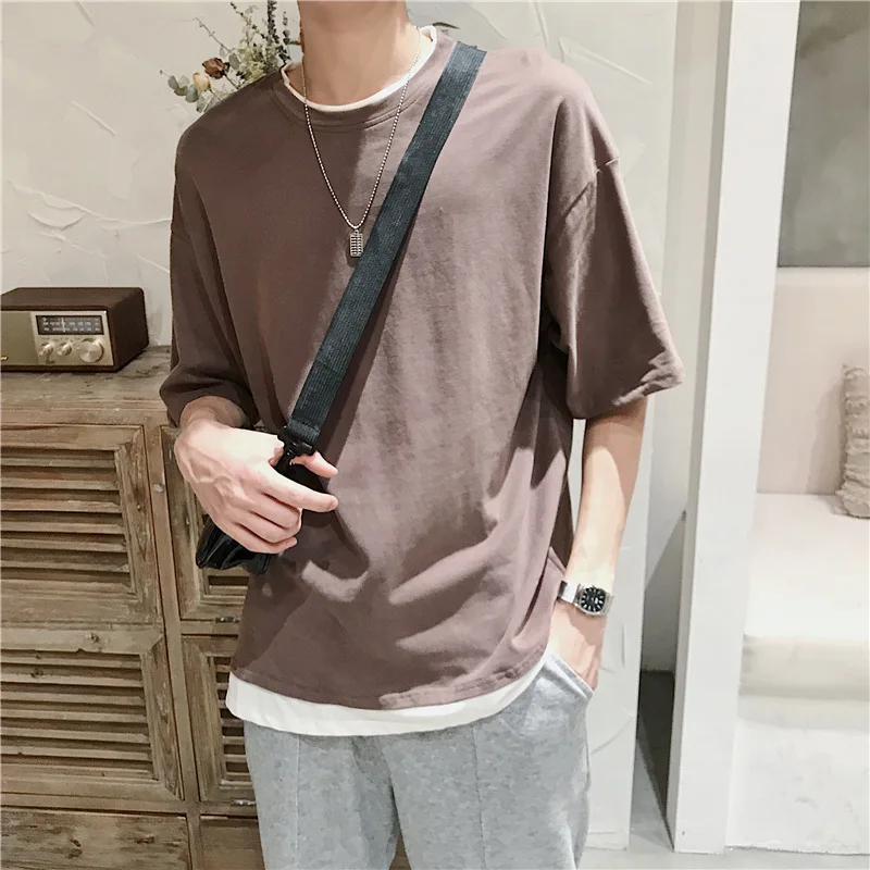 Summer Short-Sleeved T-shirt Men's Trendy Loose Clothes Fake Two-Piece Suit Solid Color Fashion Brand Men's Clothing
Summer Short-Sleeved T-shirt Men's Trendy Loose Clothes Fake Two-Piece Suit Solid Color Fashion Brand Men's Clothing