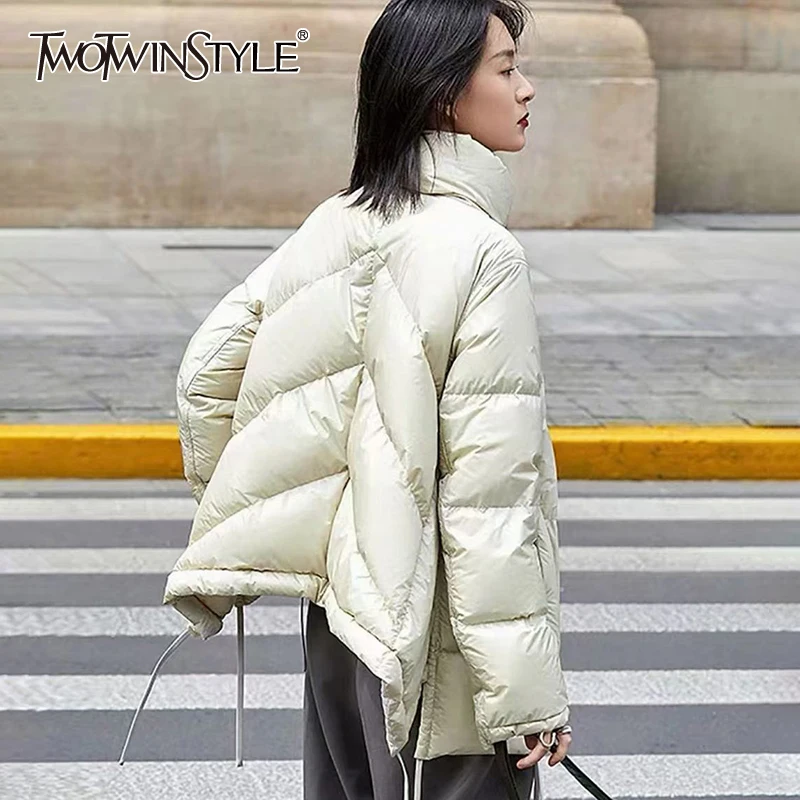 TWOTWINSTYLE Solid Lace Up Down Jacket Female Stand Collar Long Sleeve Loose Temperament Fashion Coat For Women Winter Style New
TWOTWINSTYLE Solid Lace Up Down Jacket Female Stand Collar Long Sleeve Loose Temperament Fashion Coat For Women Winter Style New