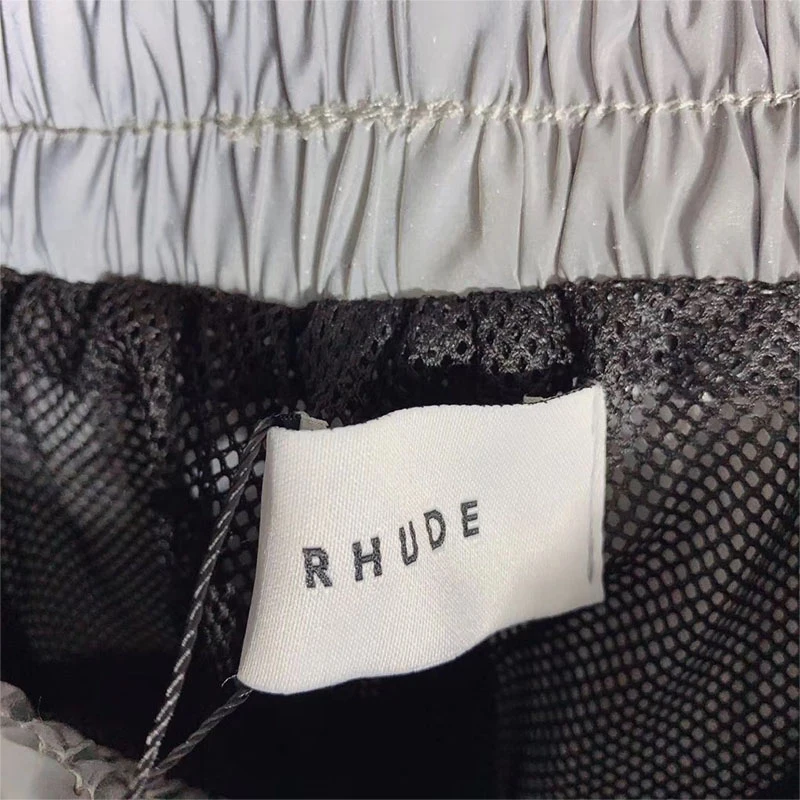 High Street Reflective Rhude Shorts Men Women 1:1 Loose Hip Hop Casual High Quality Zip Pocket Drawstring Mesh Rhude Shorts 
High Street Reflective Rhude Shorts Men Women 1:1 Loose Hip Hop Casual High Quality Zip Pocket Drawstring Mesh Rhude Shorts