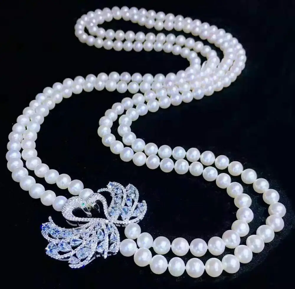 Women's fashion jewelry micro inlaid zircon accessories 75-80cm 7-8mm white freshwater pearl necklace sweater chain
Women's fashion jewelry micro inlaid zircon accessories 75-80cm 7-8mm white freshwater pearl necklace sweater chain