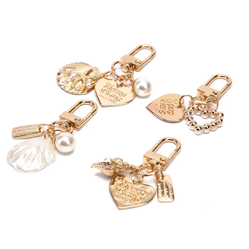 1PCS Bag Pendant Keyring Marine Metal Letter Peach Heart Seashell Faux Pearl Stunning Charm Keyrings
1PCS Bag Pendant Keyring Marine Metal Letter Peach Heart Seashell Faux Pearl Stunning Charm Keyrings