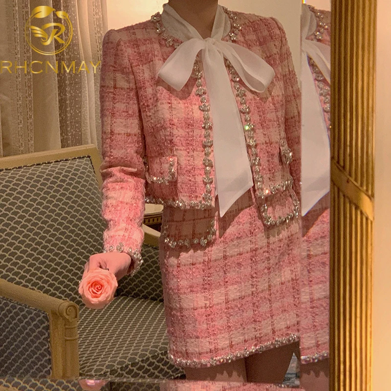 Small Fragrance Temperament Plaid Tweed Woolen 2 Pieces Set Autumn Fashion O-Neck Beaded Short Coat + High Waist Mini Skirt Sets 
Small Fragrance Temperament Plaid Tweed Woolen 2 Pieces Set Autumn Fashion O-Neck Beaded Short Coat + High Waist Mini Skirt Sets