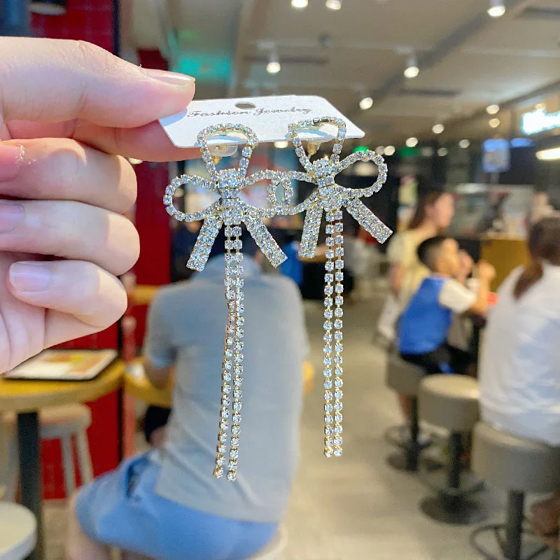 Needle Korean Fashion Personality Earrings Full Rhinestone Bowknot Tassel Long Earrings Design Earrings Women
Needle Korean Fashion Personality Earrings Full Rhinestone Bowknot Tassel Long Earrings Design Earrings Women