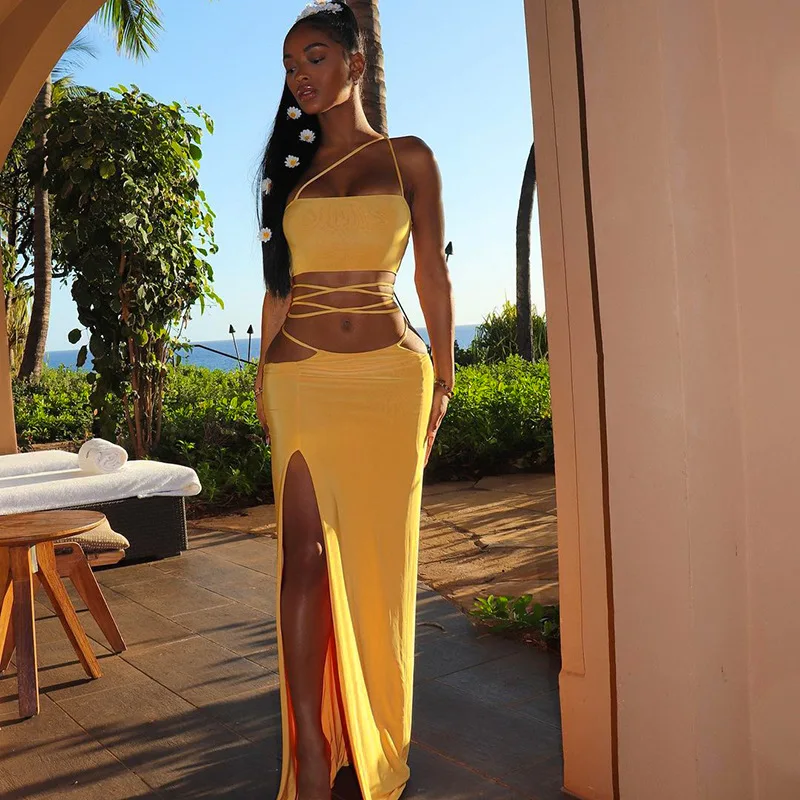 2021 Spring Women Outfit 2PCS Set Halter Bandage Crop Tops Split A-line Skirt Hollow Out Sexy Party Clubwear High Street
2021 Spring Women Outfit 2PCS Set Halter Bandage Crop Tops Split A-line Skirt Hollow Out Sexy Party Clubwear High Street