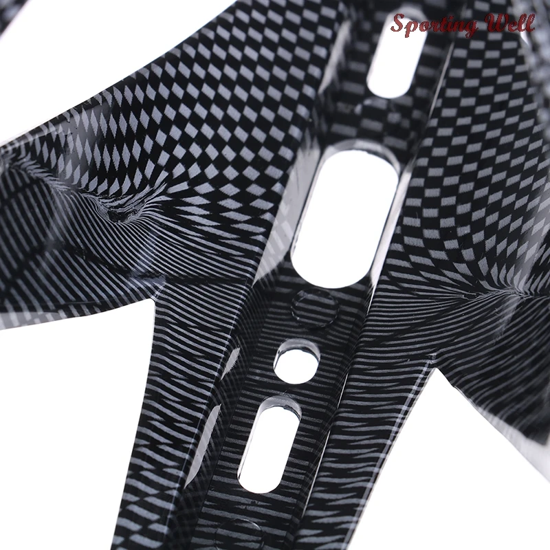 Carbon Fiber Drink Cup Rack Bicycle Bike Water Bottle Cage Super Tough Road Cycling Bottle Holder Bike Part
Carbon Fiber Drink Cup Rack Bicycle Bike Water Bottle Cage Super Tough Road Cycling Bottle Holder Bike Part