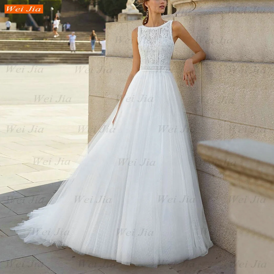 Sexy Backless Wedding Dress 2021 White Bridal Gowns O Neck Lace Mariage Tulle A Line Scoop Neck Custom Made Vestido De Novia 
Sexy Backless Wedding Dress 2021 White Bridal Gowns O Neck Lace Mariage Tulle A Line Scoop Neck Custom Made Vestido De Novia