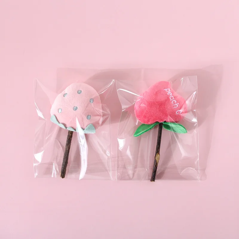 1PC Plush Pet Cat Stick Peach Funny Cute Flower Strawberry Cleaning Pet Supplies Interactive Toy Tooth Cleaning Lollipop
1PC Plush Pet Cat Stick Peach Funny Cute Flower Strawberry Cleaning Pet Supplies Interactive Toy Tooth Cleaning Lollipop