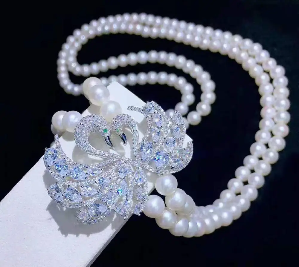 Women's fashion jewelry micro inlaid zircon accessories 75-80cm 7-8mm white freshwater pearl necklace sweater chain
Women's fashion jewelry micro inlaid zircon accessories 75-80cm 7-8mm white freshwater pearl necklace sweater chain