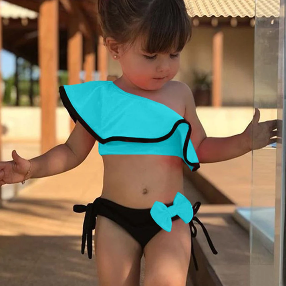Dropship New Summer Baby Kids Girl Two Piece Swimsuit Child Swimwear Ruffles Bow Water Sports Bikini Shoulder Beach Bathing 2021 
Dropship New Summer Baby Kids Girl Two Piece Swimsuit Child Swimwear Ruffles Bow Water Sports Bikini Shoulder Beach Bathing 2021