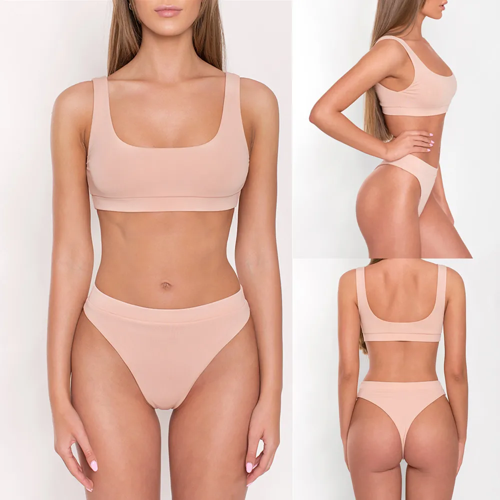 2020 new sexy bikini European and American swimsuit ladies split solid color high waist slim soft pack swimsuit 
2020 new sexy bikini European and American swimsuit ladies split solid color high waist slim soft pack swimsuit