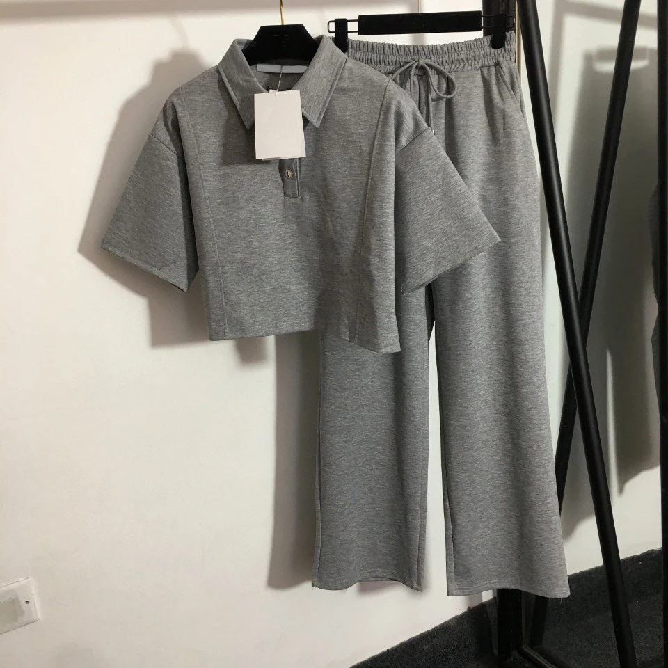 High Quality Luxury Summer Women Short Sleeve Crop Top Polo Tshirts + Elastic Waist Wide Leg Pants 2pcs Set
High Quality Luxury Summer Women Short Sleeve Crop Top Polo Tshirts + Elastic Waist Wide Leg Pants 2pcs Set