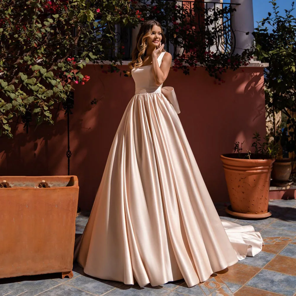 Simple Champage Satin Wedding Dress With Bow Square Neck Elegant Wedding Party Dress Princess Custom Beach Bridal Dress trouwjur
Simple Champage Satin Wedding Dress With Bow Square Neck Elegant Wedding Party Dress Princess Custom Beach Bridal Dress trouwjur