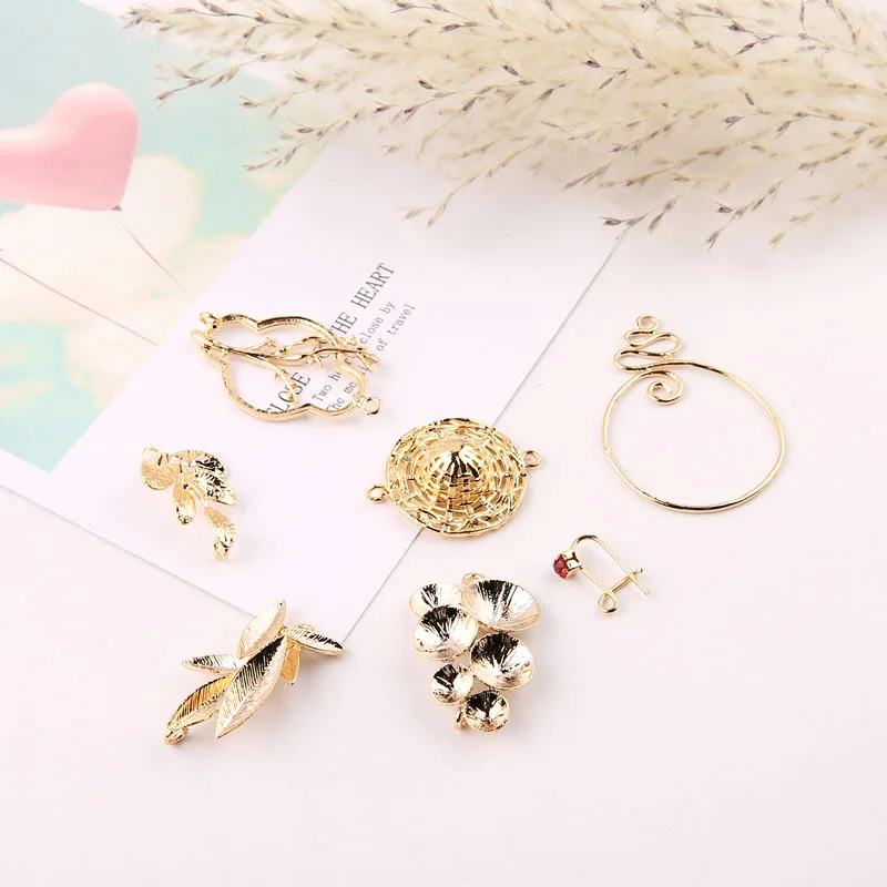 DIY accessories copper-plated real gold color preservation branches, leaves, straw hat earrings material pendant
DIY accessories copper-plated real gold color preservation branches, leaves, straw hat earrings material pendant