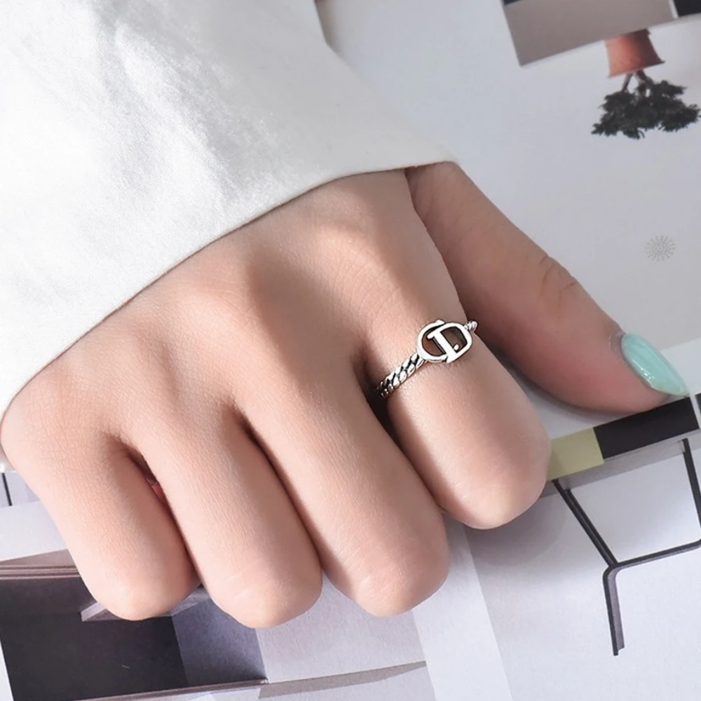 New boutique S925 sterling silver open ring ladies European and American new asymmetric ring distressed retro CD letter jewelry
New boutique S925 sterling silver open ring ladies European and American new asymmetric ring distressed retro CD letter jewelry