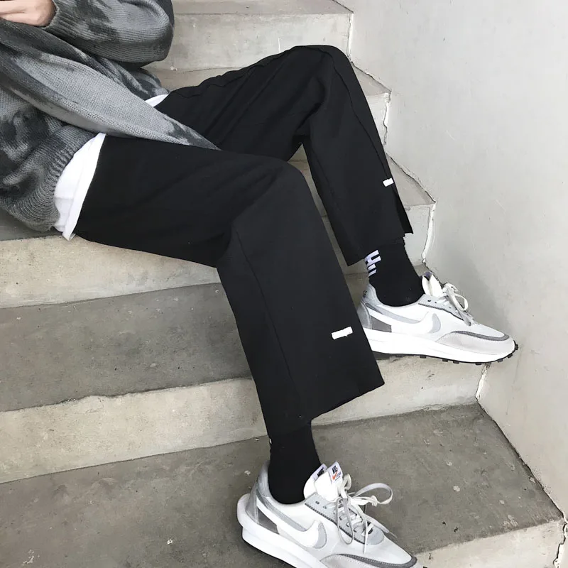 Spring Sweatpants Men's Fashion Solid Color Cotton Casual Pants Men Streetwear Wild Loose Straight Trousers Mens Track Pants
Spring Sweatpants Men's Fashion Solid Color Cotton Casual Pants Men Streetwear Wild Loose Straight Trousers Mens Track Pants