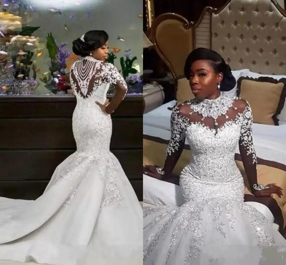 African Mermaid Wedding Dresses Long Sleeves High Neck Illusion Lace Appliques Crystal Beading Sheer Custom Bridal Gowns Crystal
African Mermaid Wedding Dresses Long Sleeves High Neck Illusion Lace Appliques Crystal Beading Sheer Custom Bridal Gowns Crystal