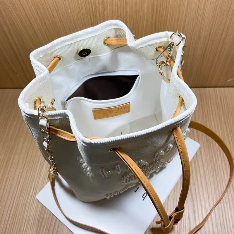 Women Shoulder Bag Fashion Pearl Casual Tote Outdoor Bag Canvas Handbag Messenger Bags Sac Main Femme Designer Bag
Women Shoulder Bag Fashion Pearl Casual Tote Outdoor Bag Canvas Handbag Messenger Bags Sac Main Femme Designer Bag