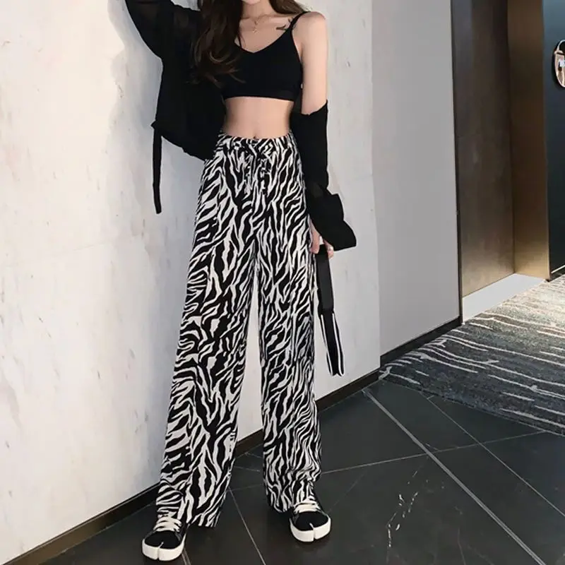 Брюки женские прямые с эластичным поясом, повседневные свободные универсальные штаны в стиле high street с принтом зебры, с высокой талией, весна...
Брюки женские прямые с эластичным поясом, повседневные свободные универсальные штаны в стиле high street с принтом зебры, с высокой талией, весна...