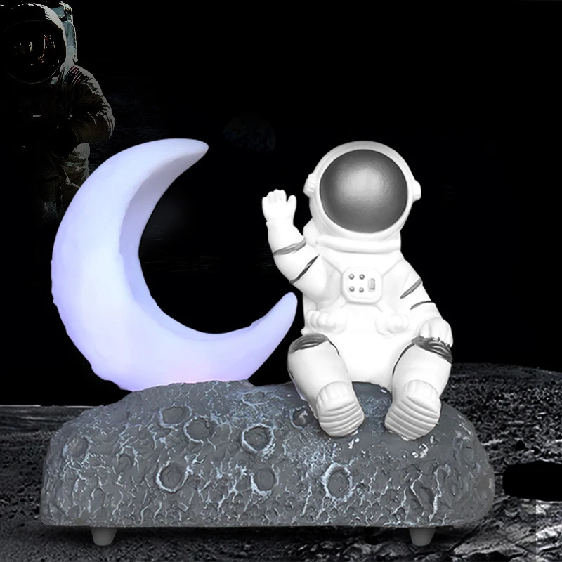 Bluethood Stereo with LED Lantern Astronaut and Meniscus Moon Type Multi-Functional Stereo for Children's Room Bedroom QJY99
Bluethood Stereo with LED Lantern Astronaut and Meniscus Moon Type Multi-Functional Stereo for Children's Room Bedroom QJY99