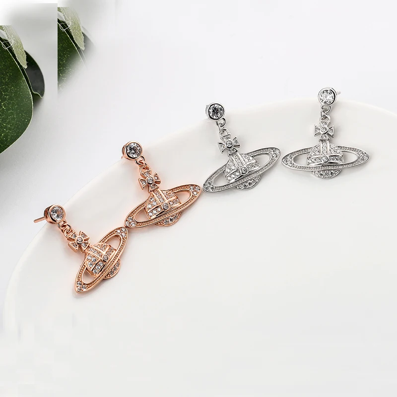 Saturn earrings with zircon star-studded crosses are fashionable, personalized and allergy-proof female earrings4
Saturn earrings with zircon star-studded crosses are fashionable, personalized and allergy-proof female earrings4