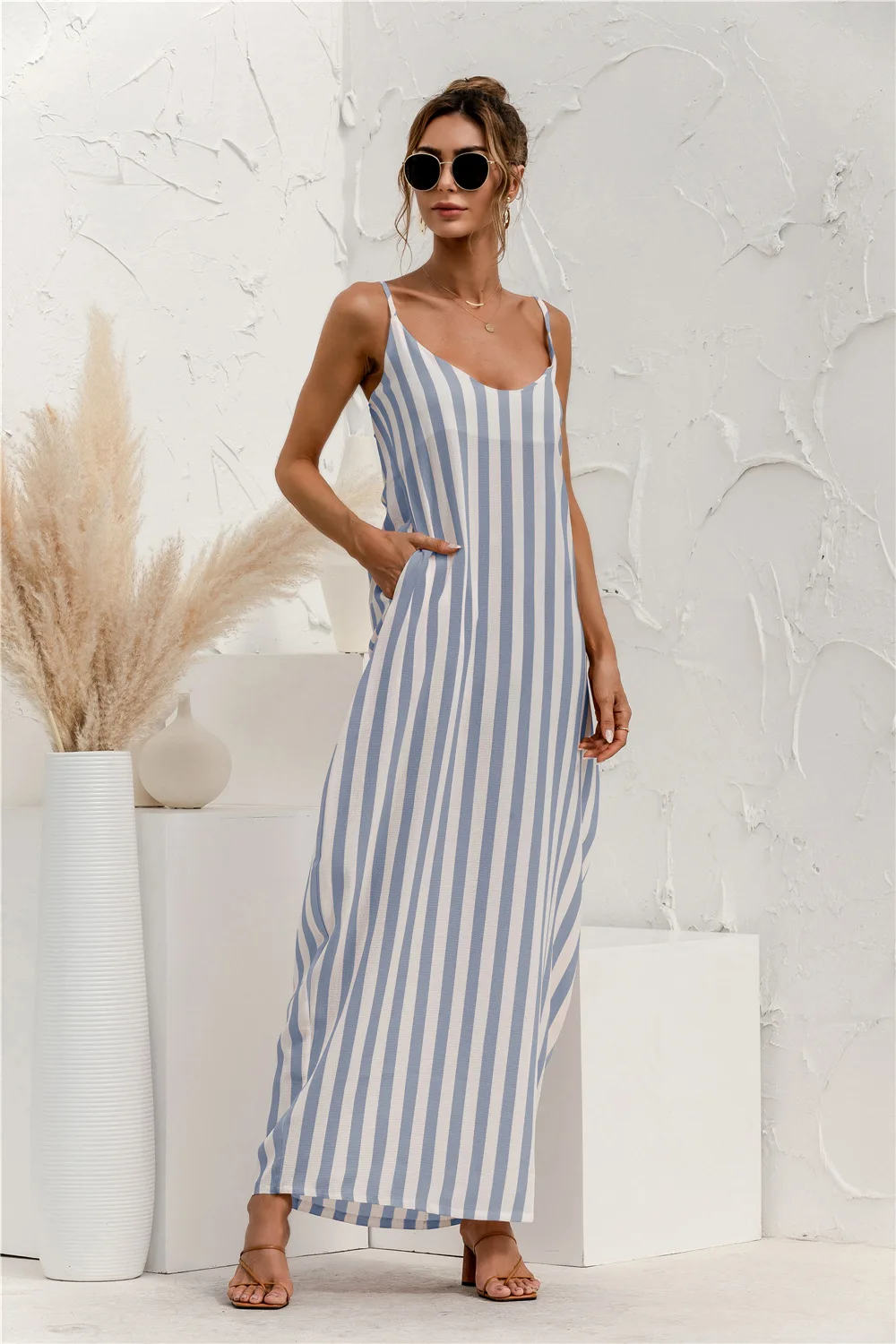 2021 spring and summer suspenders striped backless loose big swing beach dress dresses women
2021 spring and summer suspenders striped backless loose big swing beach dress dresses women