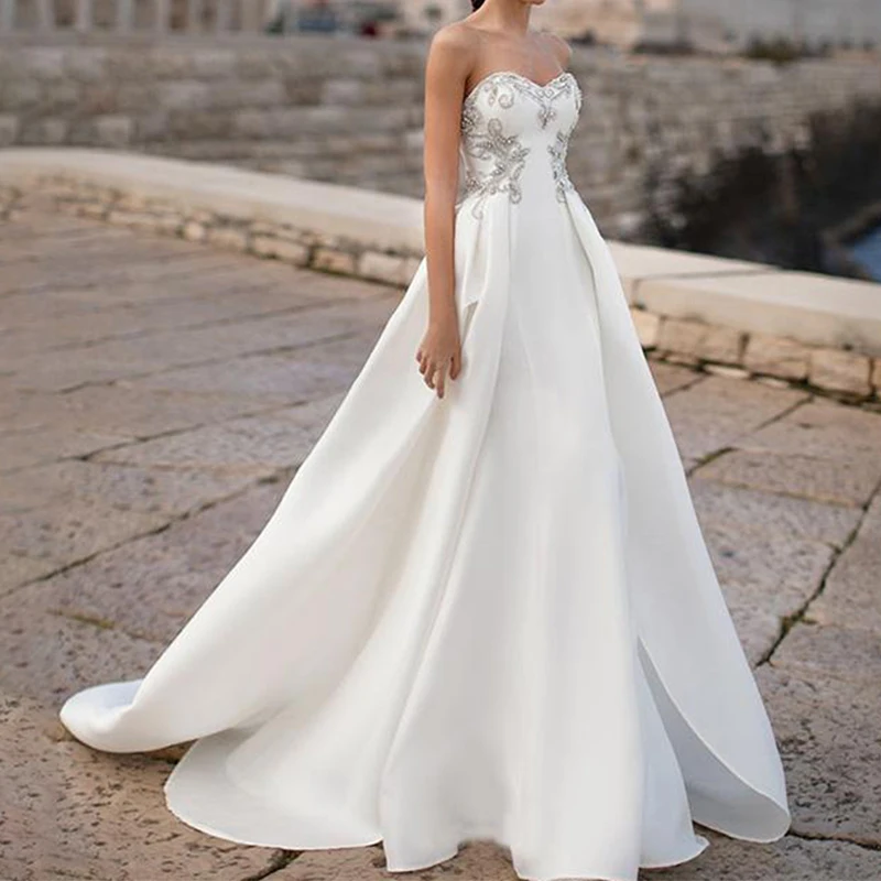 2022 Sexy Wedding Dress Strapless Sweetheart Bridal Wedding Gowns Hand Beaded White Satin A-line Bridal Dresses
2022 Sexy Wedding Dress Strapless Sweetheart Bridal Wedding Gowns Hand Beaded White Satin A-line Bridal Dresses