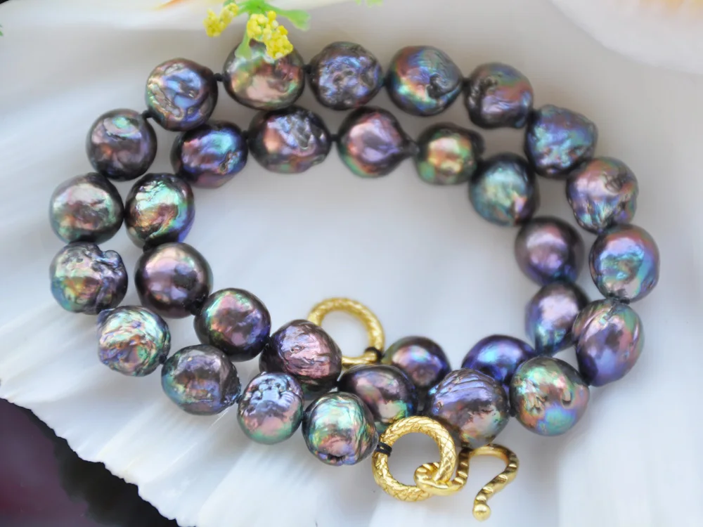 Z10522 Lustre 17"~33 12mm Peacock Black Almost Round Edison Keshi Pearl Necklace
Z10522 Lustre 17"~33 12mm Peacock Black Almost Round Edison Keshi Pearl Necklace