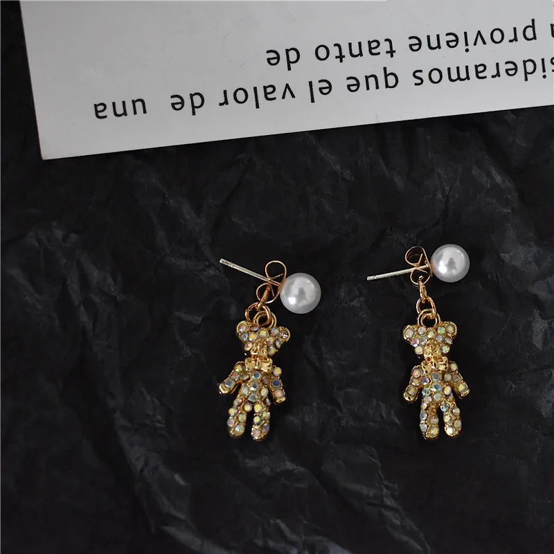 Exquisite color zircon pearl bear earrings female Korean girl heart sweet earrings charm earrings
Exquisite color zircon pearl bear earrings female Korean girl heart sweet earrings charm earrings
