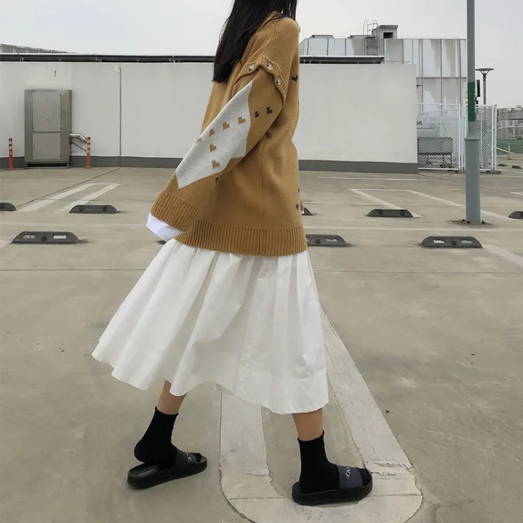 2020 new Fashion Knitted V-neck sweater women Korean tops casual splice Removable sleeve Sweater vest double wear Double wear 
2020 new Fashion Knitted V-neck sweater women Korean tops casual splice Removable sleeve Sweater vest double wear Double wear