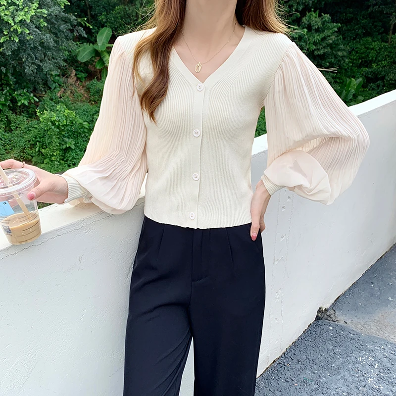 Женская короткая трикотажная рубашка в стиле пэчворк, с длинным рукавом и V-образным вырезом 
Женская короткая трикотажная рубашка в стиле пэчворк, с длинным рукавом и V-образным вырезом