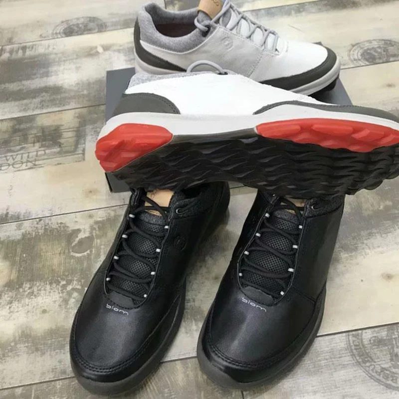 Golf Genuine Leather Shoes Men's Golf Shoes Spikeless Training Sport Sneakers Grass Walking Shoes Athletics Tour Golf Shoes Men 
Golf Genuine Leather Shoes Men's Golf Shoes Spikeless Training Sport Sneakers Grass Walking Shoes Athletics Tour Golf Shoes Men